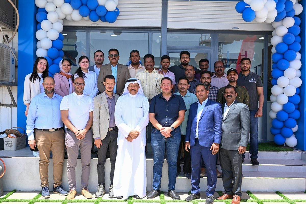 The WARBA team and guests at the showroom entrance